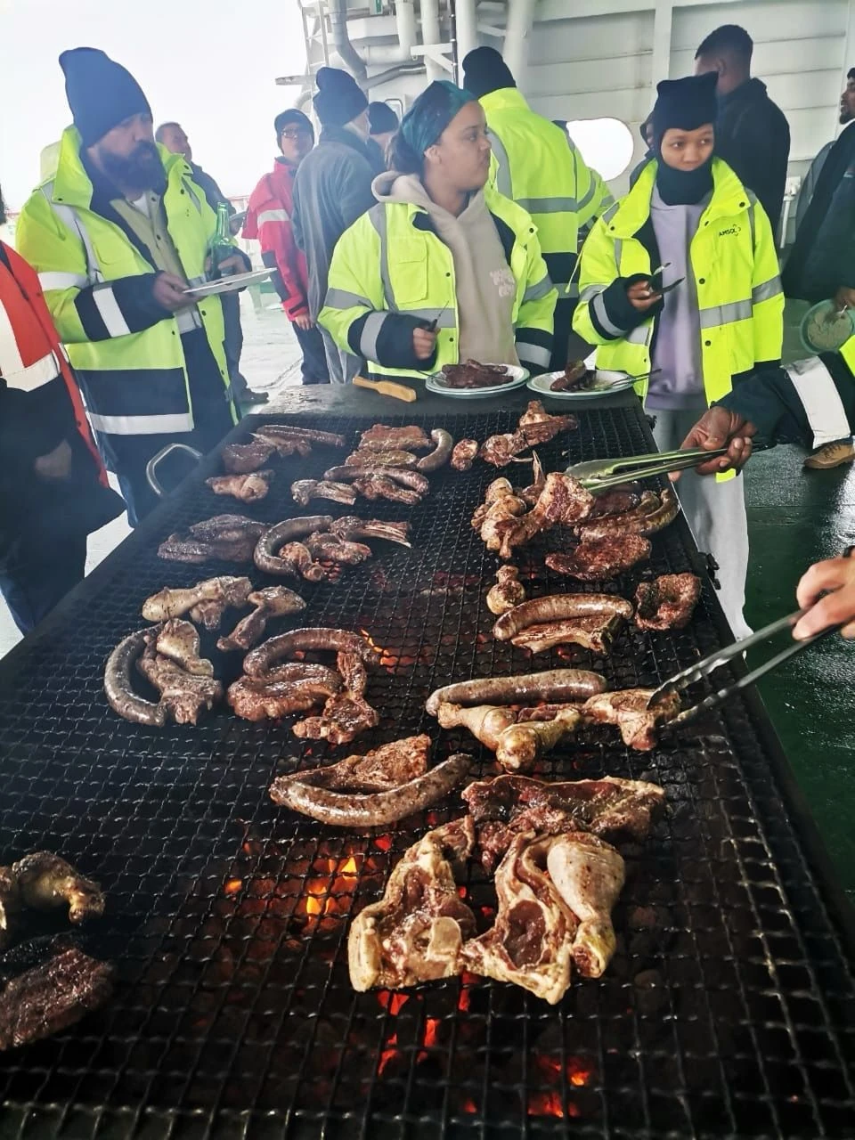 SA Agulhas II crew members enjoying the braai