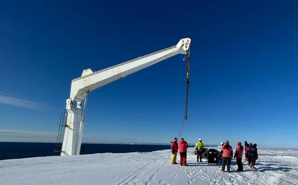 UCT SANAS team on the shelf just before slung over by crane down to the ship